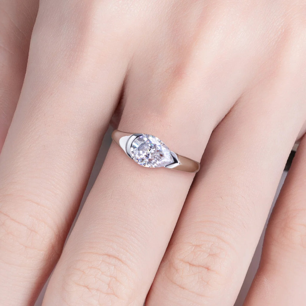 The Kade Ring lifestyle — 2.5ct pear moissanite tension mount worn on finger — Aurora Moissanite