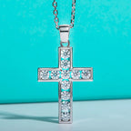 The Crux Pendant — moissanite cross necklace front view, D color VVS1, sterling silver — Aurora Moissanite