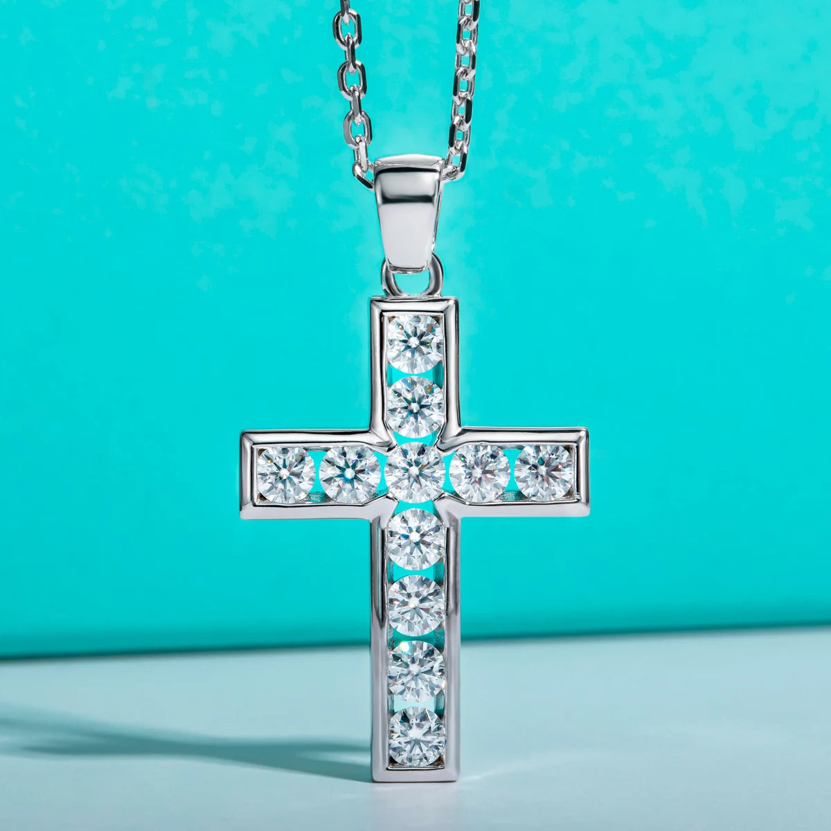 The Crux Pendant — moissanite cross necklace front view, D color VVS1, sterling silver — Aurora Moissanite