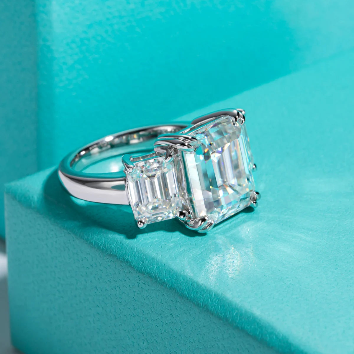 Emerald moissanite 3-stone ring 8ct center with 2ct side stones, D color VVS1 — Aurora Moissanite