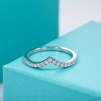The Glow Band — moissanite V-row ring, front view, 18K white gold plated — Aurora Moissanite