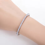 3mm moissanite bangle close-up showing D color VVS1 round stones — Aurora Moissanite