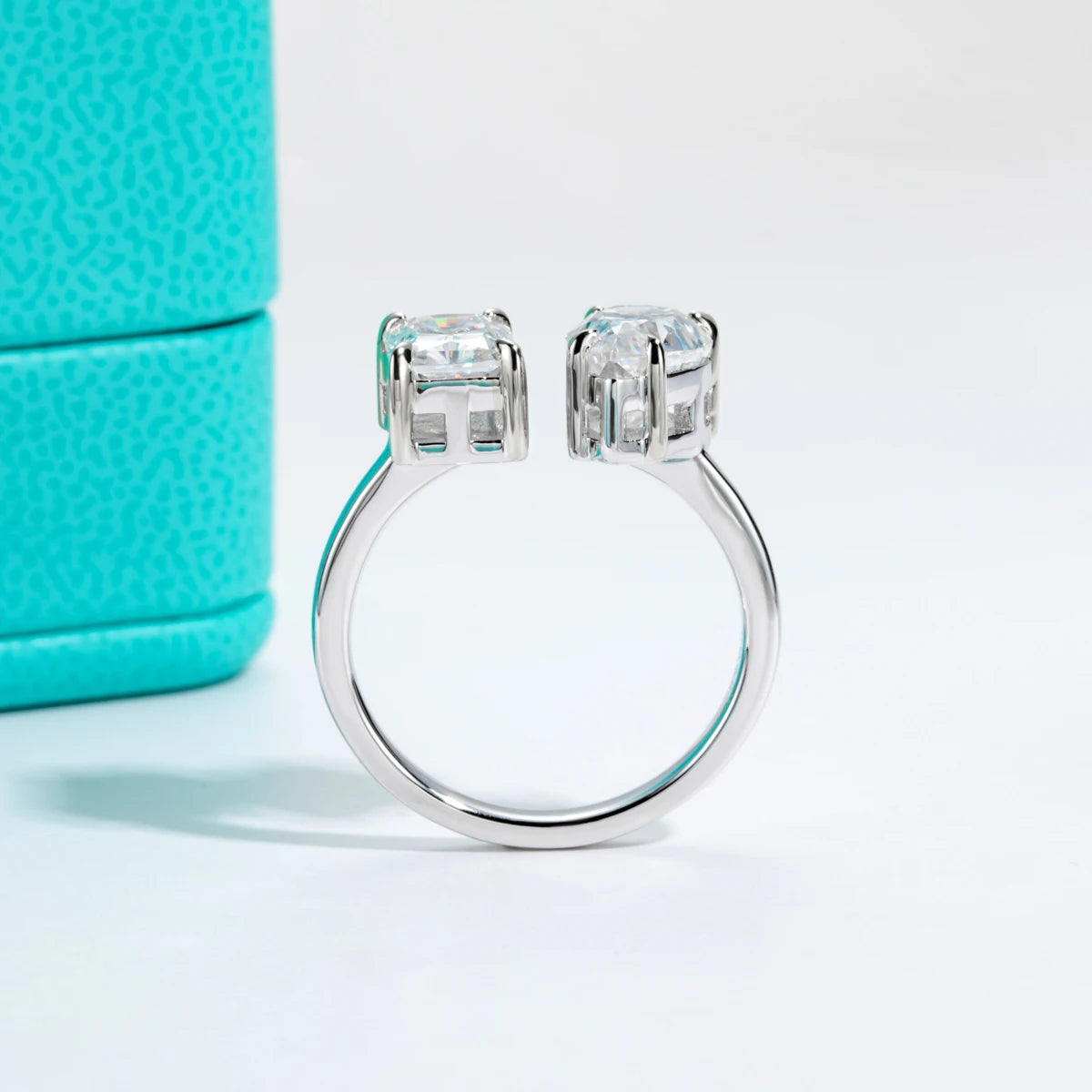 4.5ct radiant pear toi et moi ring, side profile, open-band adjustable — Aurora Moissanite