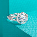 The Sena Ring worn — 3ct round moissanite Y-shape halo engagement ring — Aurora Moissanite