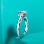 Round moissanite 3ct D color VVS1, classic prong solitaire detail — Aurora Moissanite
