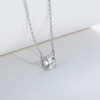 The Sol Pendant — round moissanite solitaire pendant, multiple carat options, 18K gold — Aurora Moissanite