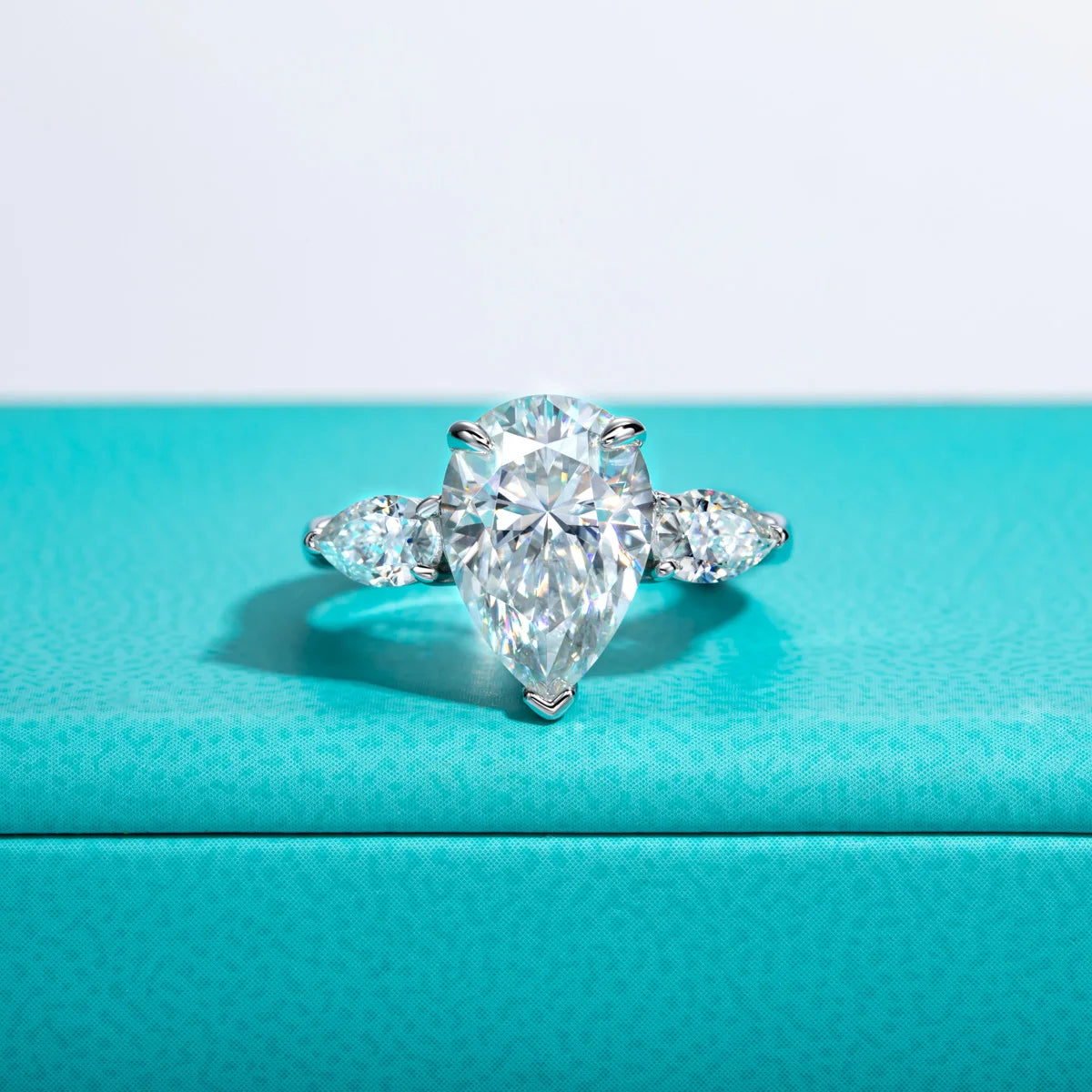 The Orla Ring — 6cttw pear moissanite ring, front view, 18K gold — Aurora Moissanite