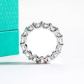 The Loop Band worn — 4.5mm moissanite full eternity band, S925 sterling silver — Aurora Moissanite