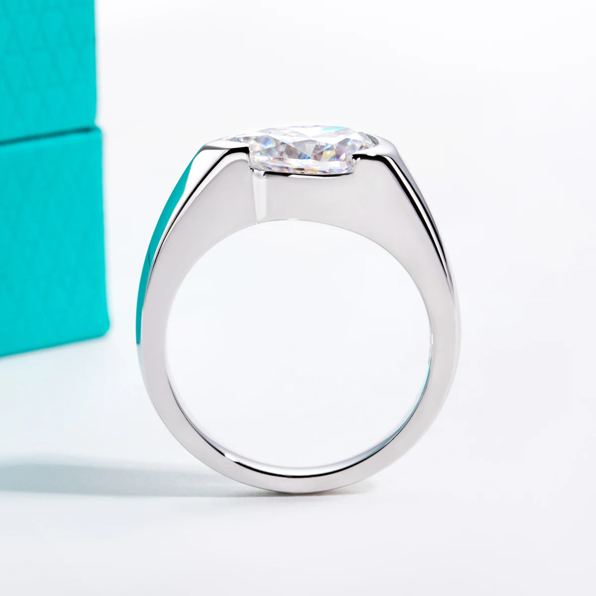 2.5ct pear moissanite tension mount ring, side profile, 18K white gold — Aurora Moissanite