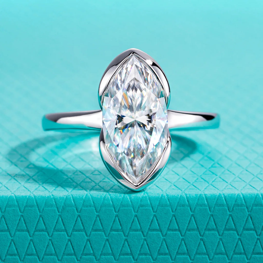 The Oryn Ring — 3ct marquise moissanite half-bezel, front view — Aurora Moissanite