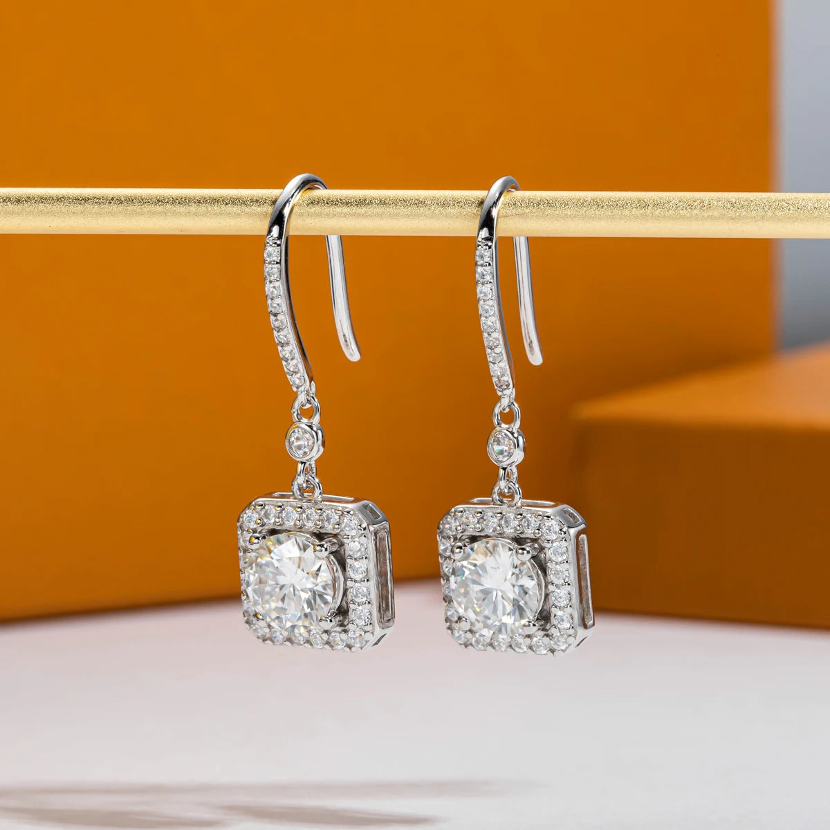 1ct moissanite drop earrings, side view, 18K gold — Aurora Moissanite