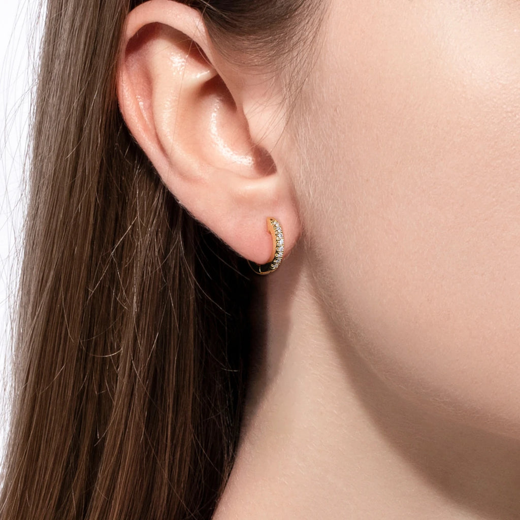 The Fawn Earrings — 1.5mm moissanite huggie hoops, 14K yellow gold — Aurora Moissanite