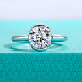 The Seren Ring worn — 2ct round moissanite half-bezel solitaire, S925 — Aurora Moissanite