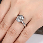 The Nara Ring worn — 3ct oval moissanite bezel engagement ring, S925 — Aurora Moissanite