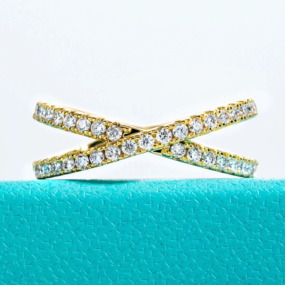The Thorn Band worn — 1.5mm moissanite X crossover ring, 18K yellow gold plated — Aurora Moissanite