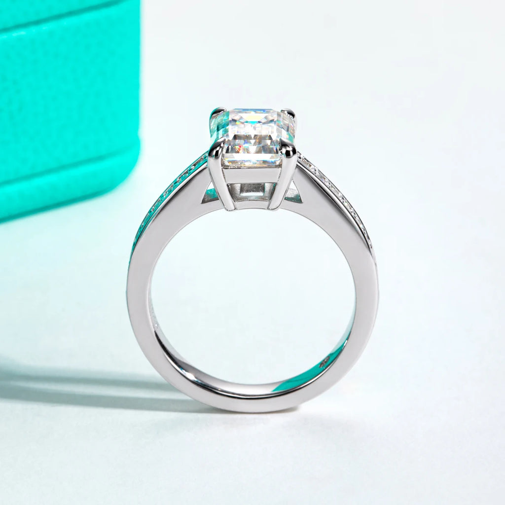 Emerald cut moissanite 3ct D color VVS1, step-cut stone detail — Aurora Moissanite