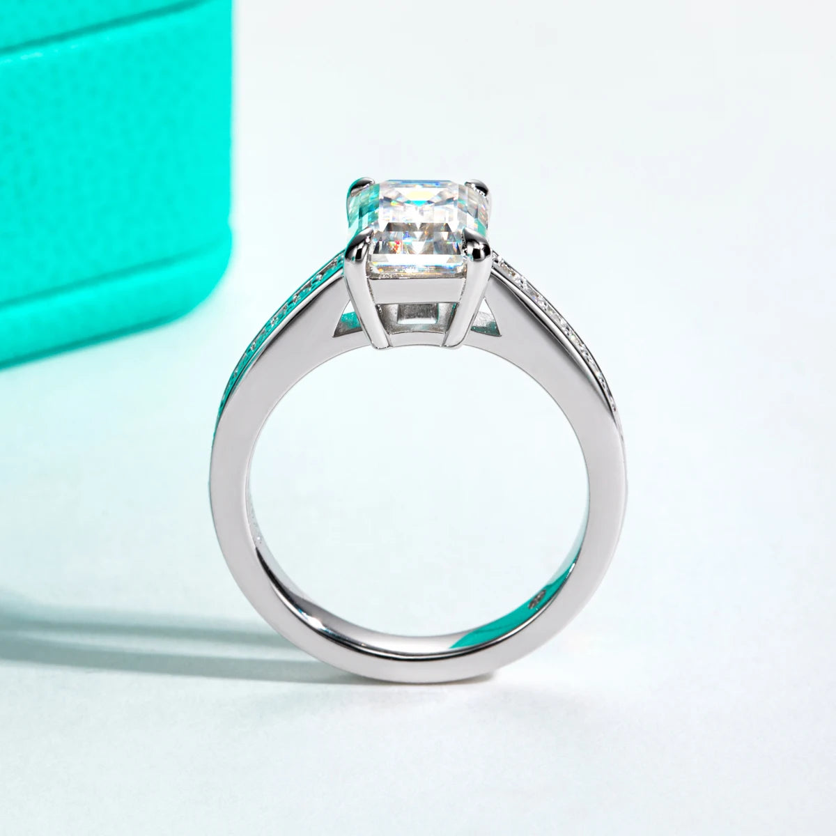 Emerald cut moissanite 3ct D color VVS1, step-cut stone detail — Aurora Moissanite