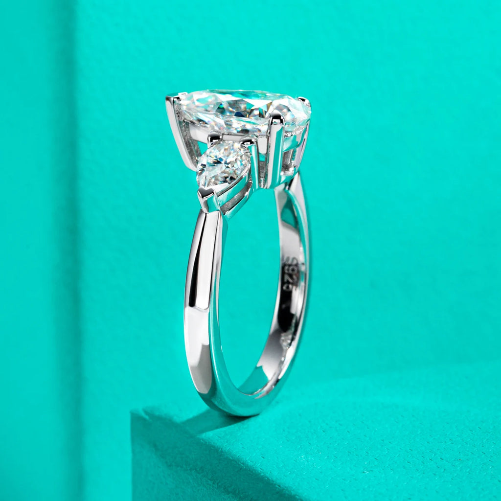 The Fern Ring — 4ct pear moissanite solitaire, front view, 18K gold plated — Aurora Moissanite