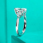 The Fern Ring — 4ct pear moissanite solitaire, front view, 18K gold plated — Aurora Moissanite