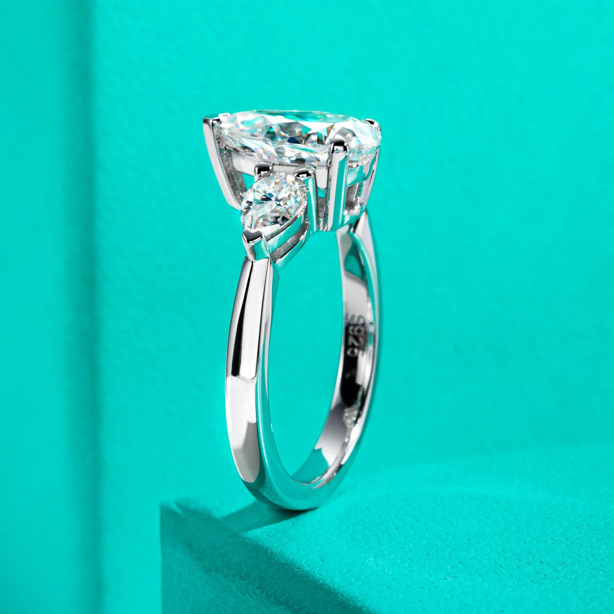The Fern Ring — 4ct pear moissanite solitaire, front view, 18K gold plated — Aurora Moissanite