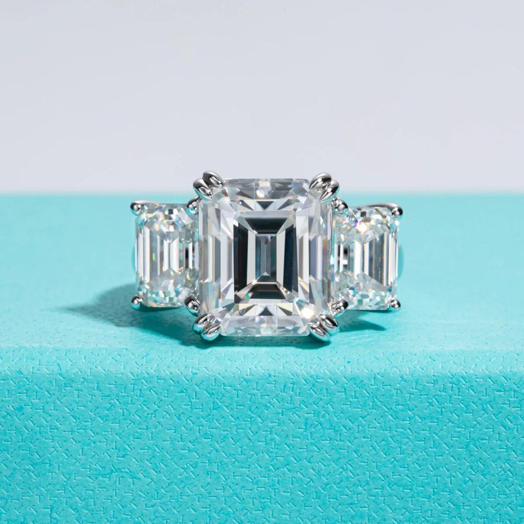 The Prism Ring — 12ct emerald moissanite 3-stone ring, front view — Aurora Moissanite