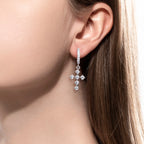 The Kael Earrings — moissanite cross huggie hoops, S925 — Aurora Moissanite