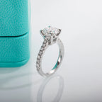 Round moissanite 3ct D color VVS1, gold prong solitaire detail — Aurora Moissanite