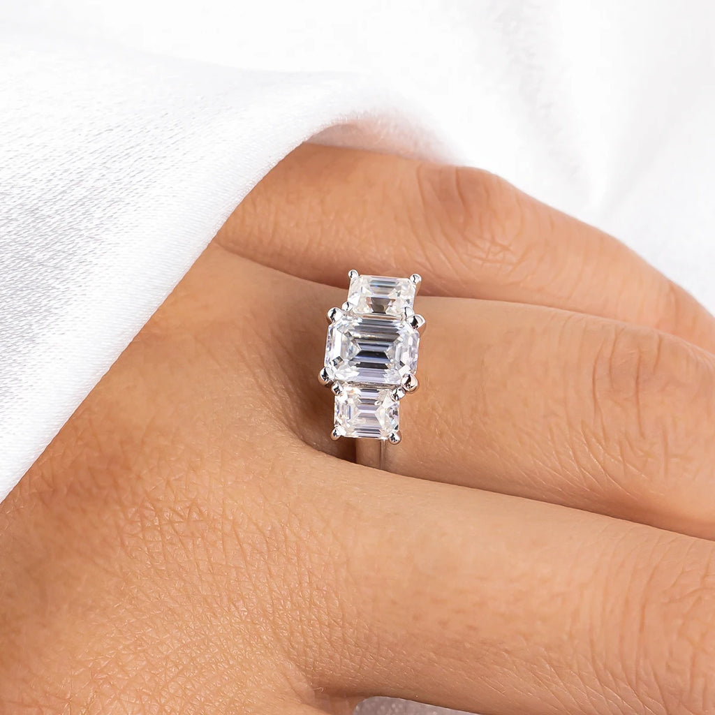 The Fen Ring worn — 1.6cttw emerald cut moissanite, 18K gold plated — Aurora Moissanite