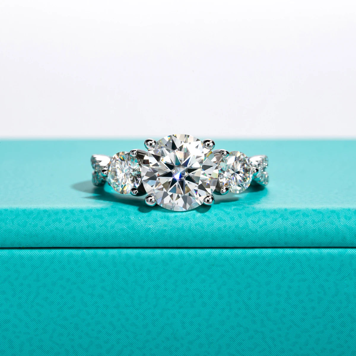 The Iola Ring — 4.25cttw three-stone moissanite, front view — Aurora Moissanite