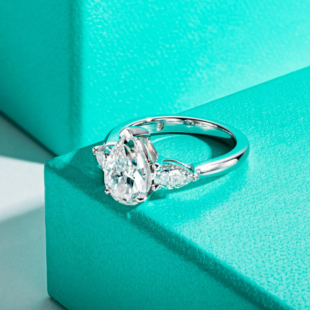 4ct pear moissanite engagement ring, side profile, 18K gold plated — Aurora Moissanite