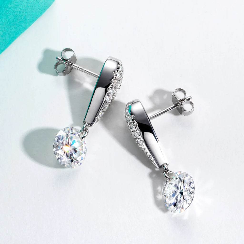 6cttw moissanite drop earrings side view, 18K gold — Aurora Moissanite