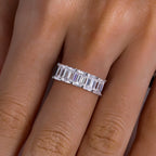 Emerald cut moissanite band, 0.6ct stones, top view showing step-cut pattern — Aurora Moissanite