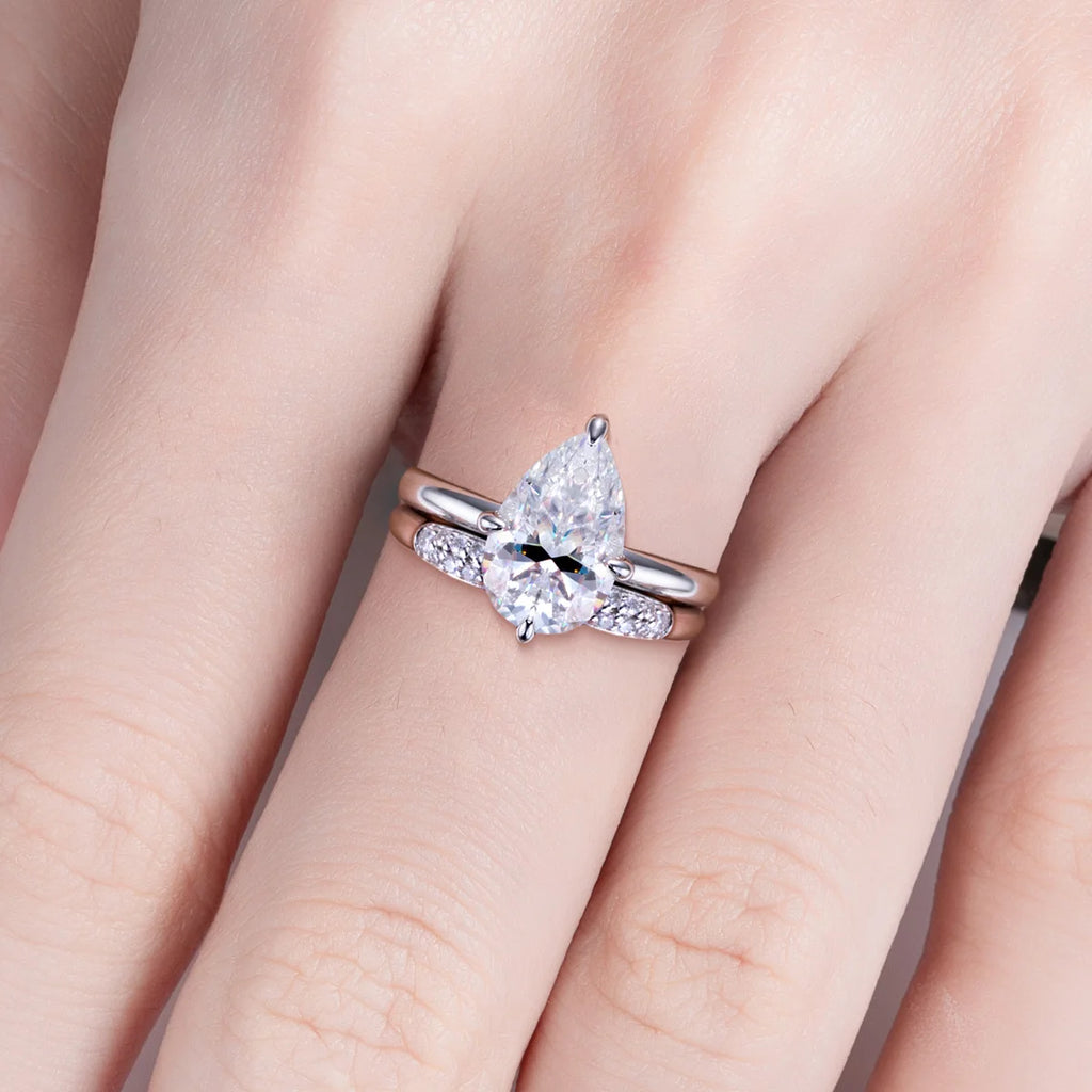Pear moissanite bridal set top view, 3ct center with adjustable wedding band — Aurora Moissanite