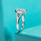 The Lark Ring lifestyle — 5ct pear moissanite solitaire worn on finger — Aurora Moissanite