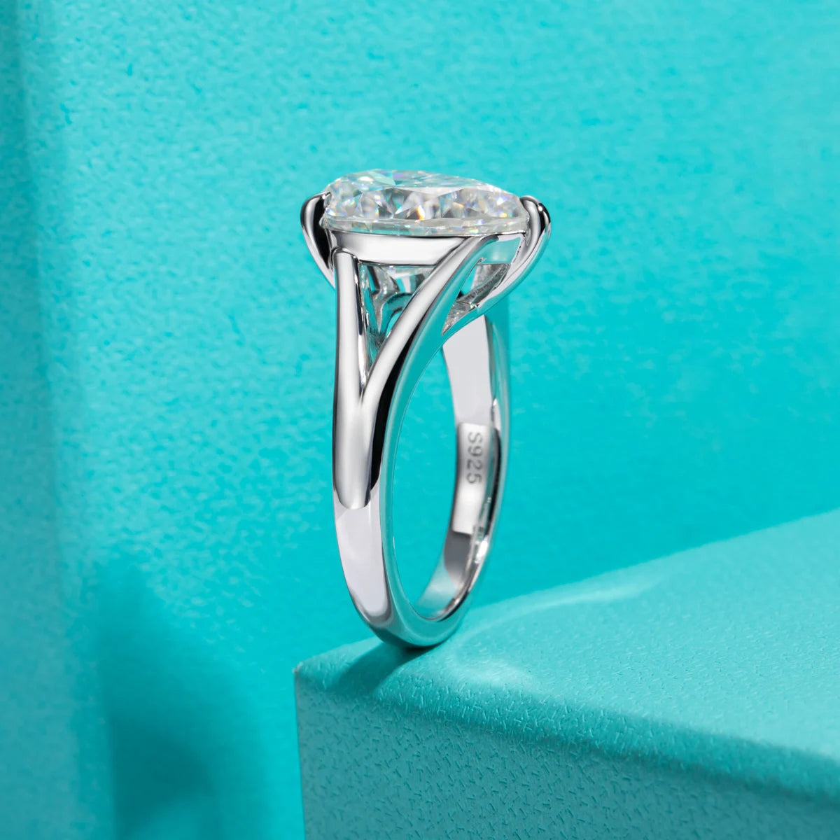 The Lark Ring lifestyle — 5ct pear moissanite solitaire worn on finger — Aurora Moissanite