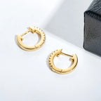 The Fawn Earrings lifestyle — huggie hoop earrings worn — Aurora Moissanite