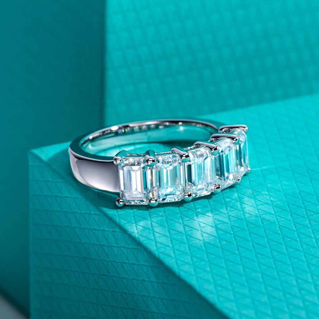 Emerald moissanite wedding band 3cttw D color VVS1, step facets visible — Aurora Moissanite