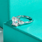 The Dusk Ring — radiant and pear moissanite two-stone ring, front view — Aurora Moissanite
