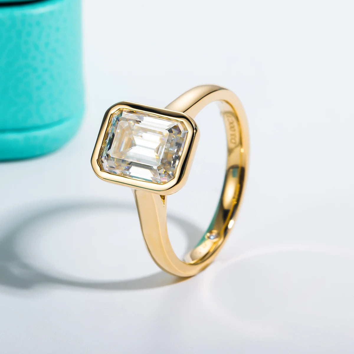 The Lyse Ring — 3ct emerald moissanite bezel, front view, 14K yellow gold — Aurora Moissanite