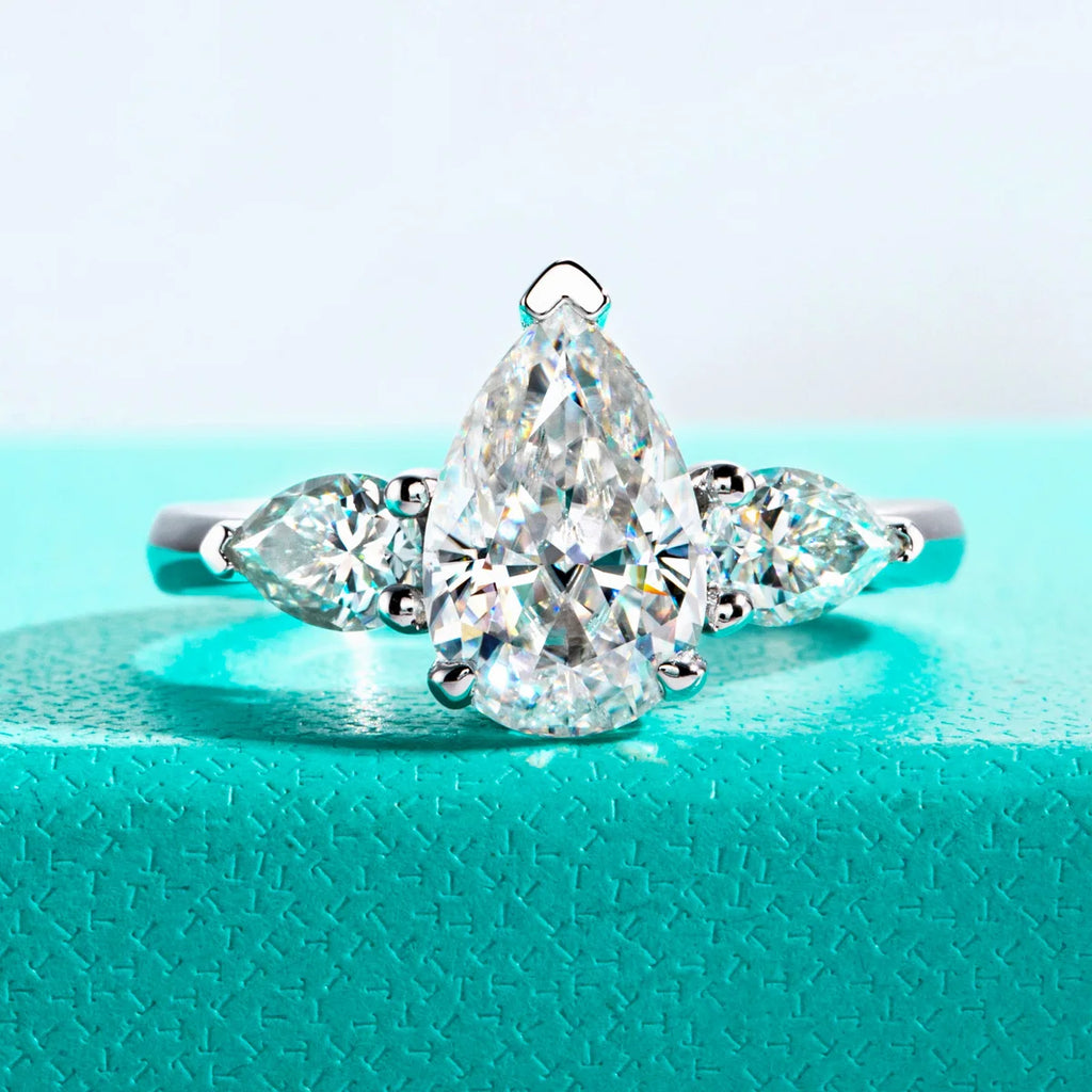 The Fern Ring worn — 4ct pear cut moissanite solitaire, 18K gold plated — Aurora Moissanite