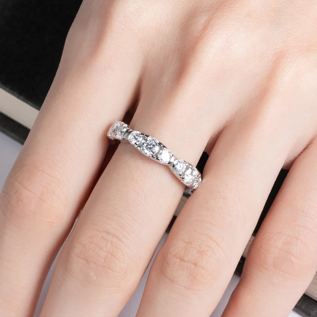 Moissanite eternity ring close-up, D color VVS1 stones around full circumference — Aurora Moissanite