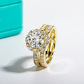 The Clair Ring worn — 2ct round moissanite bridal set, 14K yellow gold — Aurora Moissanite