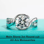 The Dara Ring worn — 3ct round moissanite bezel engagement ring, 18K gold — Aurora Moissanite