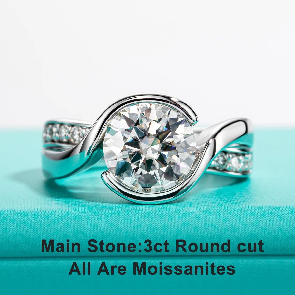 The Dara Ring worn — 3ct round moissanite bezel engagement ring, 18K gold — Aurora Moissanite