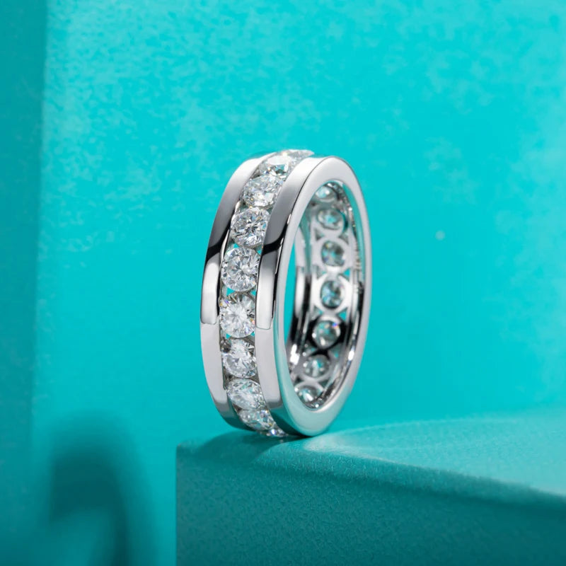 The Kell Band worn — 4mm moissanite eternity band, S925, unisex sizes 5–12 — Aurora Moissanite