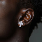 The Noir Earrings lifestyle — iced cross moissanite worn — Aurora Moissanite