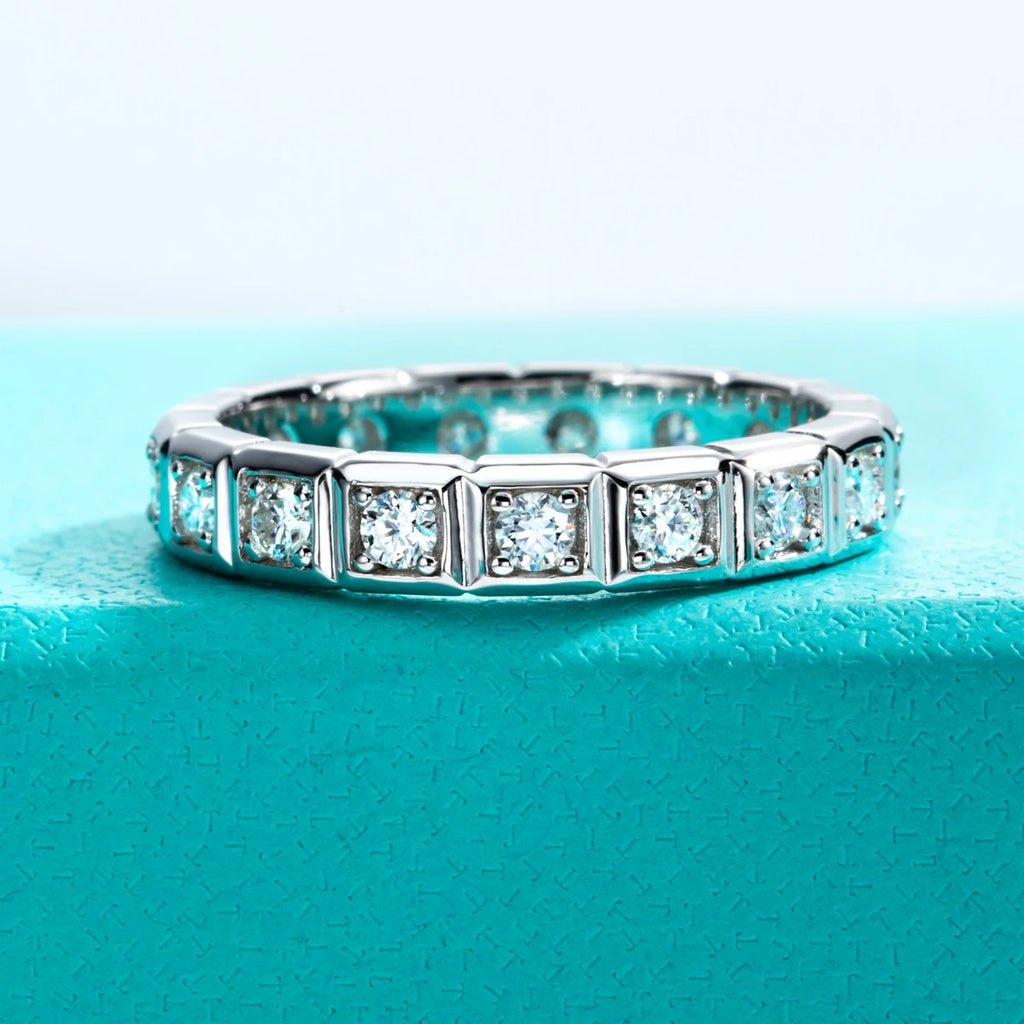 The Crest Band — 2.2mm princess moissanite eternity ring, front view — Aurora Moissanite