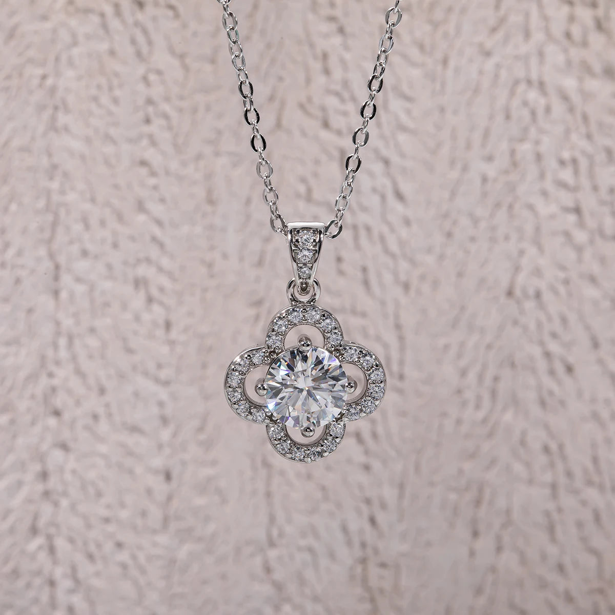 1ct moissanite halo pendant lifestyle shot, 18K white gold plated — Aurora Moissanite