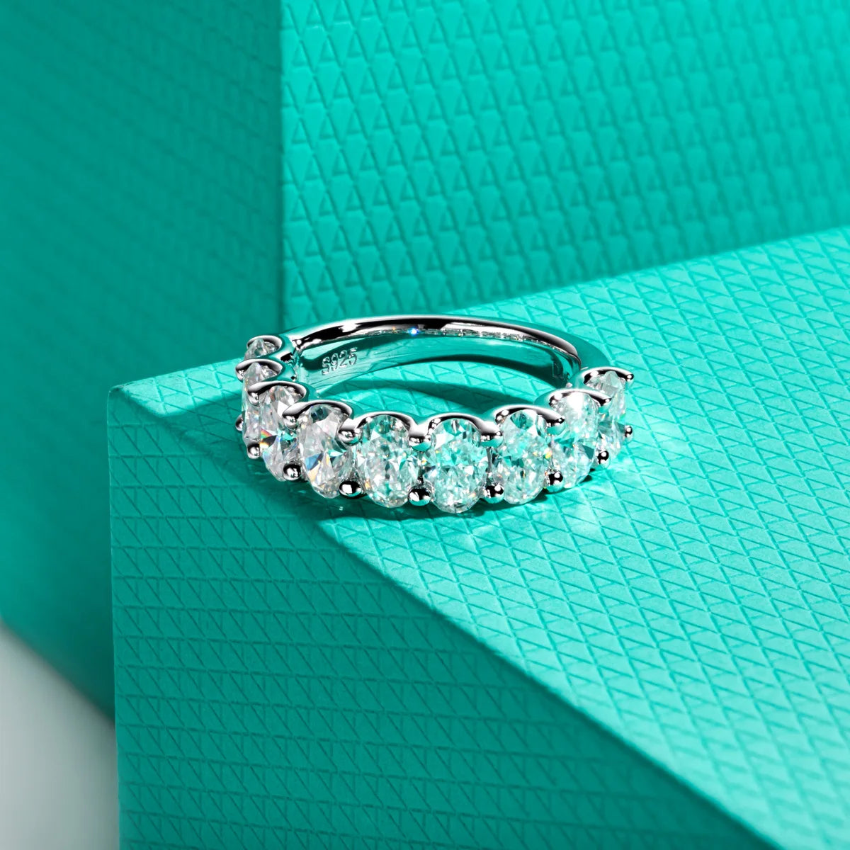 The Alto Band worn — oval moissanite half eternity wedding band, S925 — Aurora Moissanite