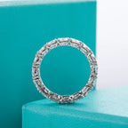 Moissanite eternity band 4mm D color VVS1, rhodium plated bright white — Aurora Moissanite